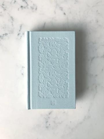 Macmillan Collector's Edition of Pride and Prejudice without book jacket, showing teal cloth binding